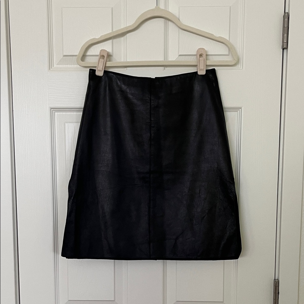 Black leather pencil skirt with side slits